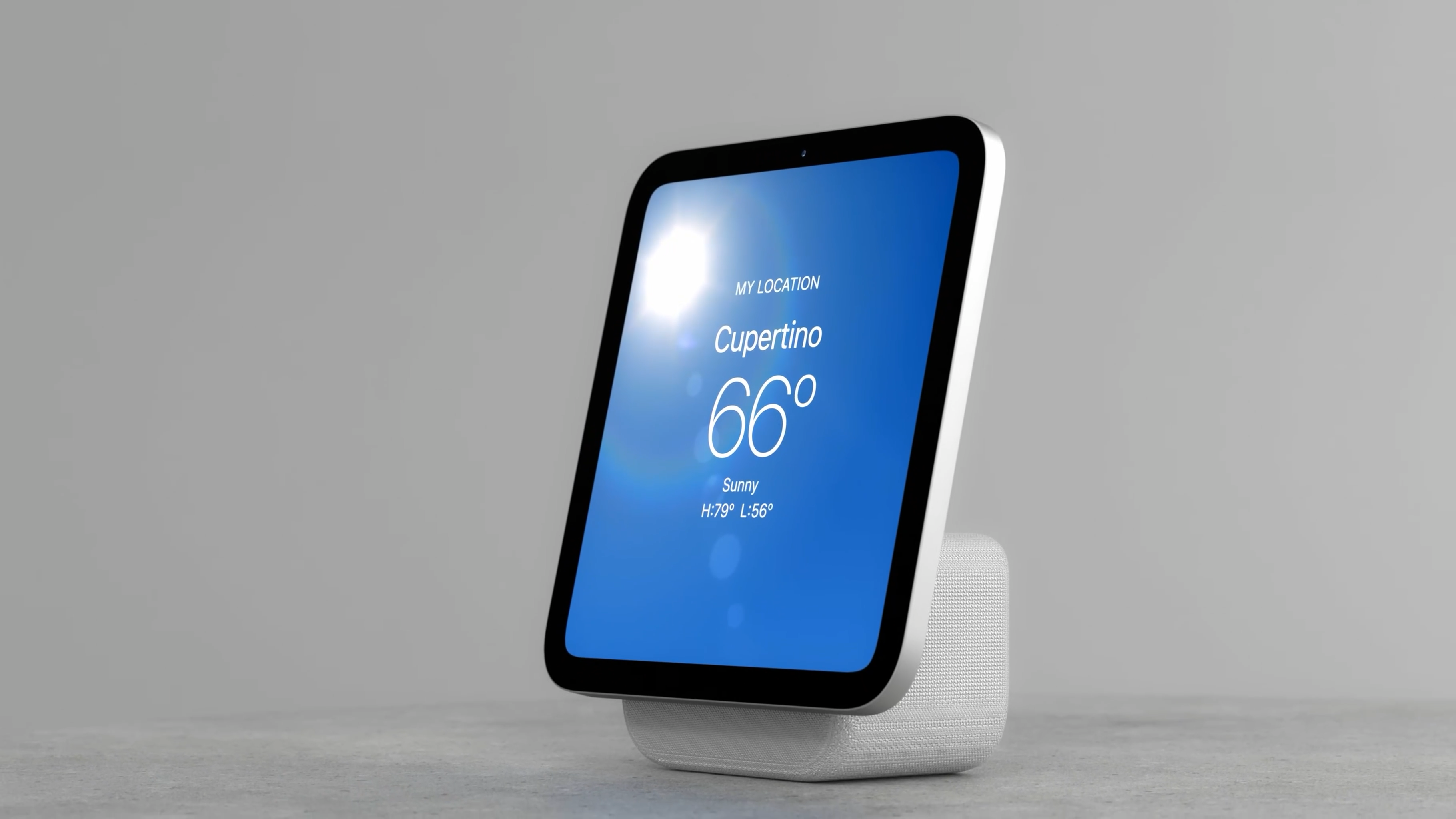 Auto-generated description: A smart display with a blue screen shows weather information for Cupertino, including a temperature of 66°F and sunny conditions.