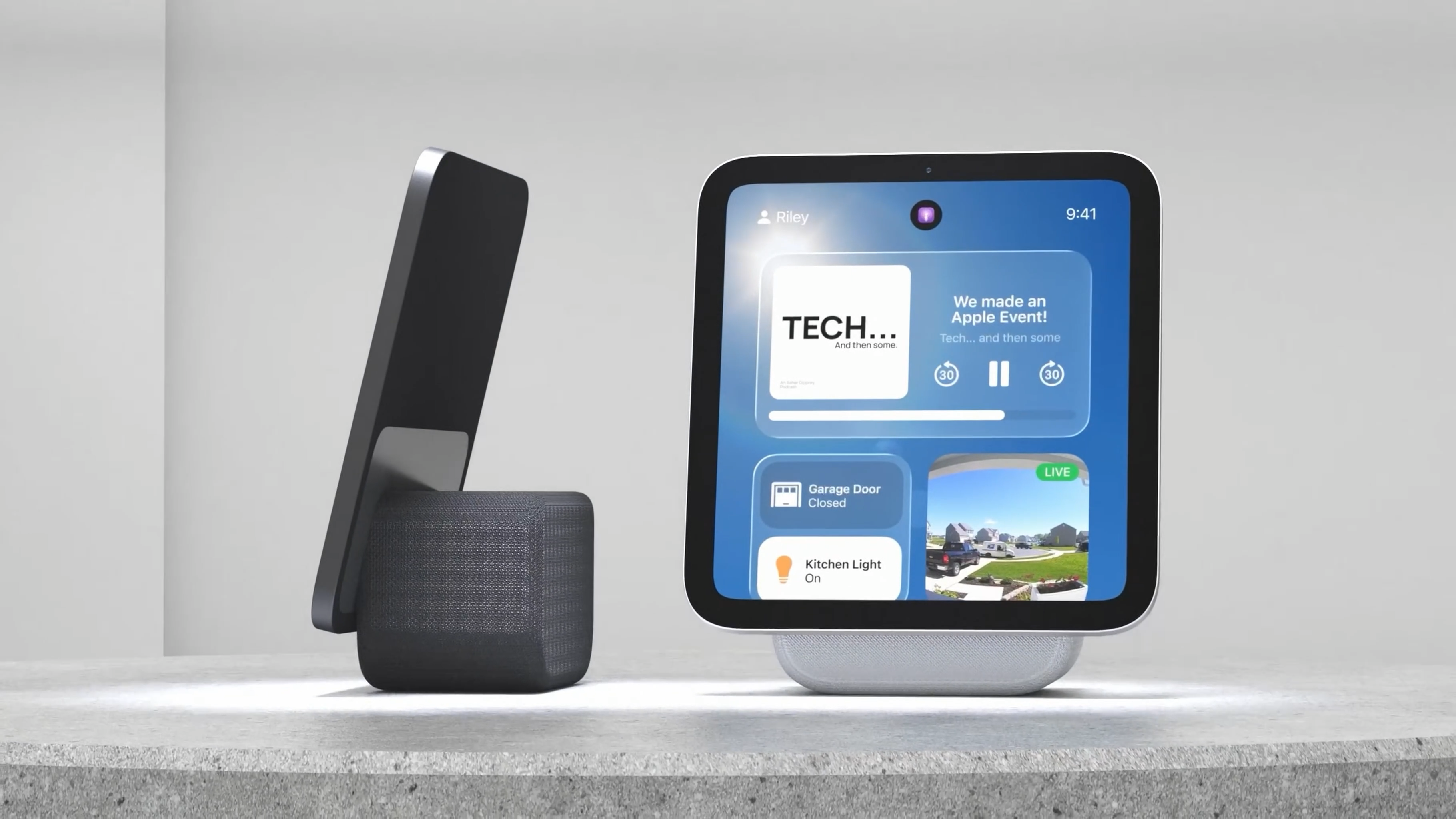 Auto-generated description: Two sleek, modern smart display devices are shown, one in profile and one facing forward with a digital home interface.